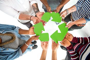 group people holding recycling sign concept